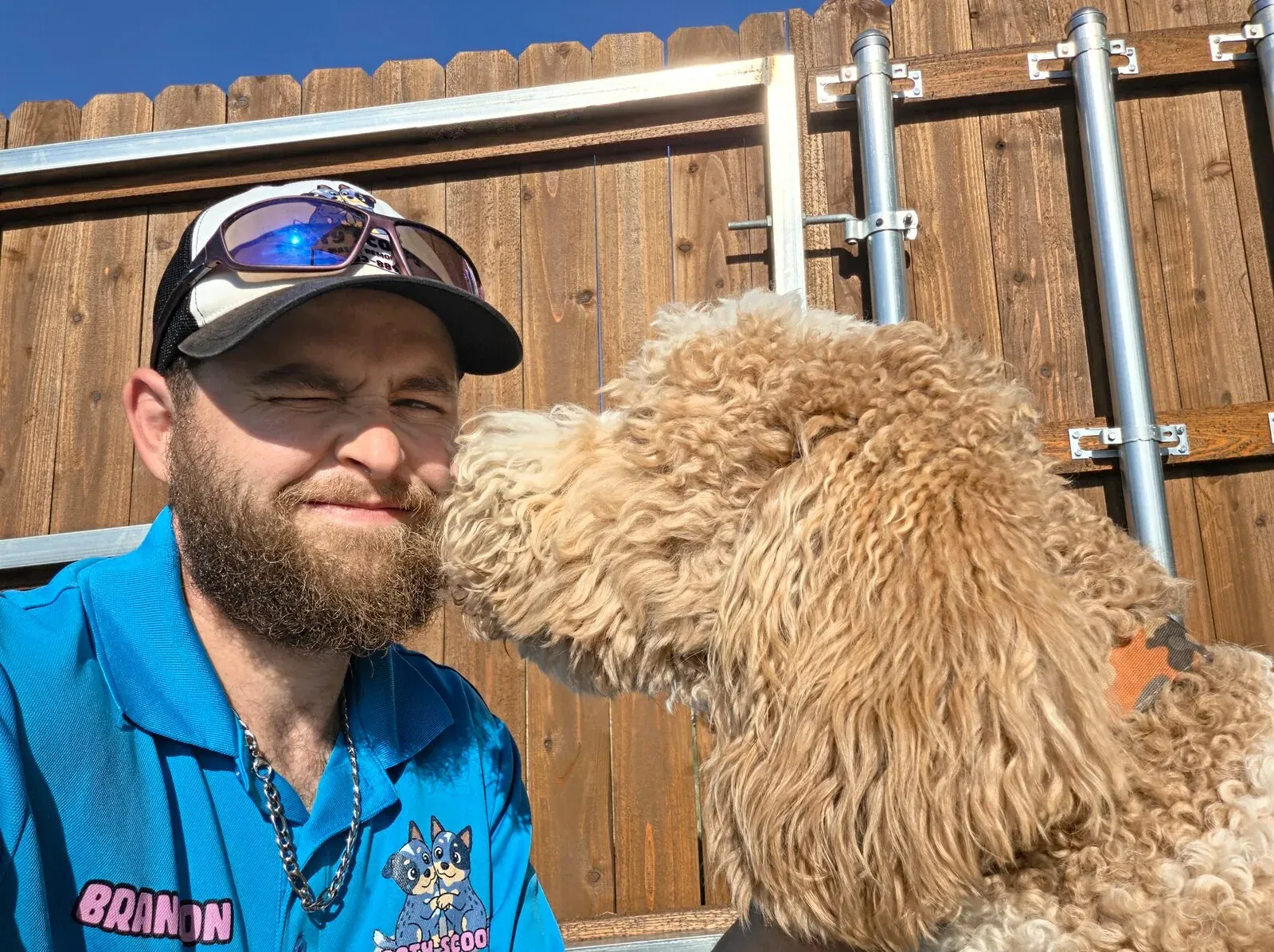 A customer's doodle giving Brandon a kiss at the gate
