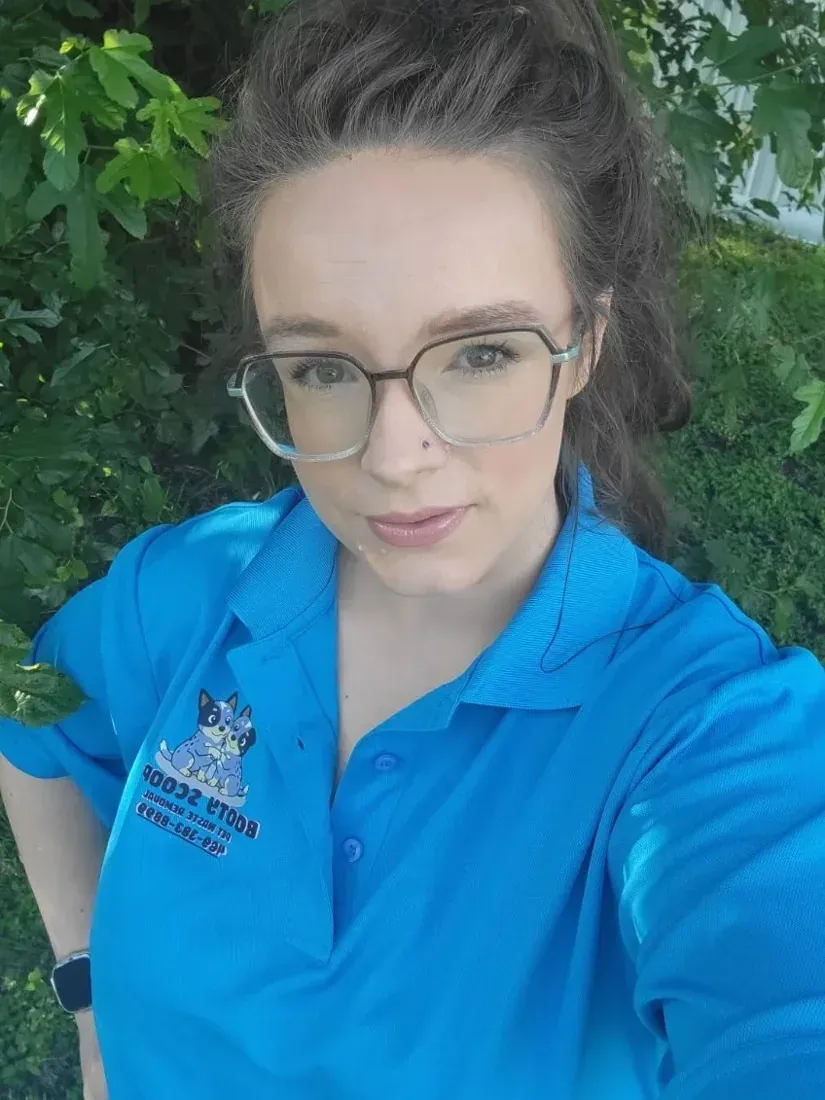 Christina, co-owner of Booty Scoopy, in her blue Booty Scoopy polo